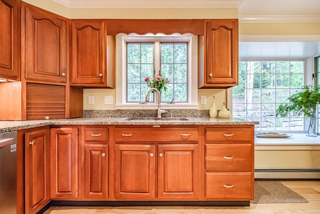 55 Evergreen Ln, Windham, ME 04062 - kitchen featuring a sink, crown molding, light stone countertops, brown cabinetry, and a baseboard radiator