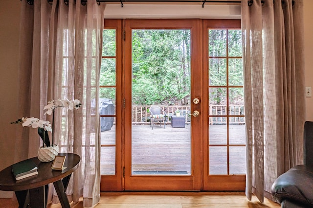 55 Evergreen Ln, Windham, ME 04062 - doorway with light wood-type flooring and french doors