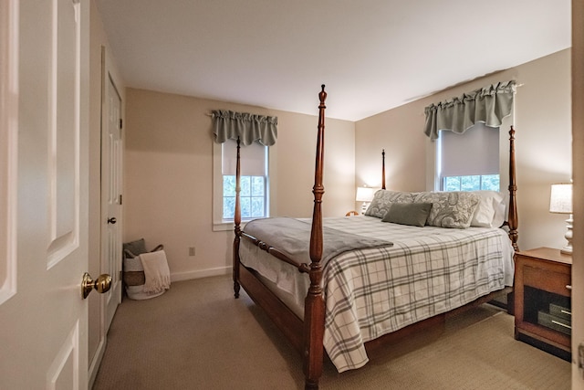 55 Evergreen Ln, Windham, ME 04062 - carpeted bedroom featuring multiple windows and baseboards