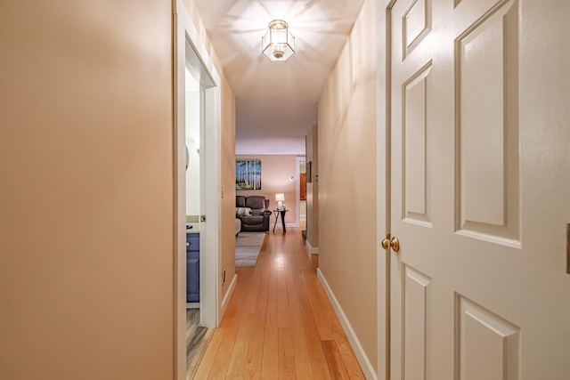 55 Evergreen Ln, Windham, ME 04062 - hallway with light wood finished floors and baseboards