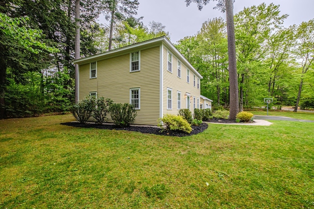 55 Evergreen Ln, Windham, ME 04062 - view of side of home with a yard