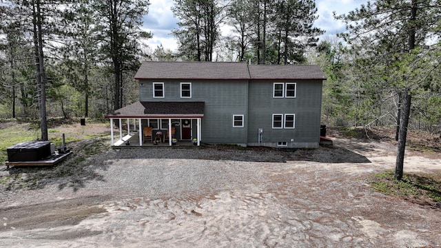 53 Branch Brook Ln, Newfield, ME 04095 - rear view of house with roof with shingles and driveway