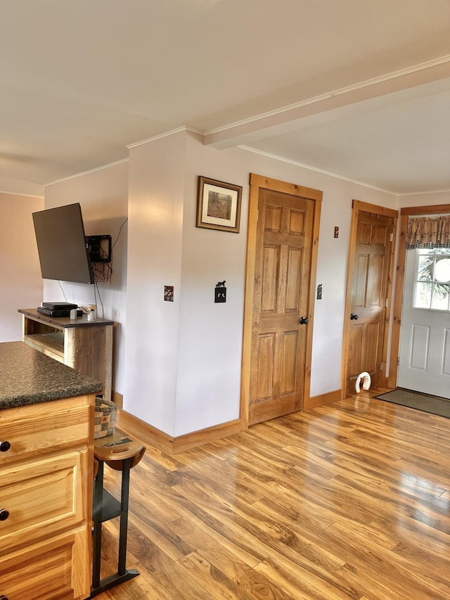 53 Branch Brook Ln, Newfield, ME 04095 - entryway featuring baseboards, light wood finished floors, and crown molding
