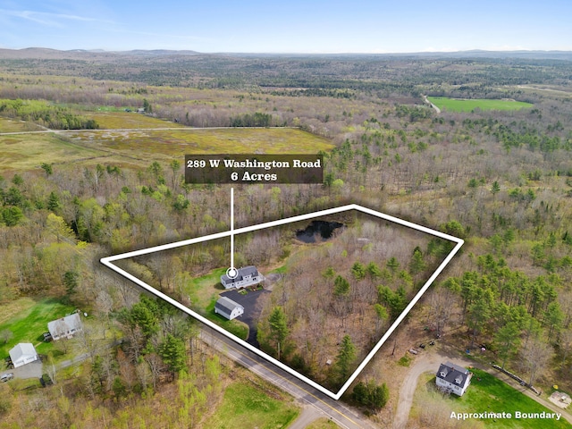 289 W Washington Rd, Washington, ME 04574 - aerial overview of property's location featuring property parcel outlined and a forest