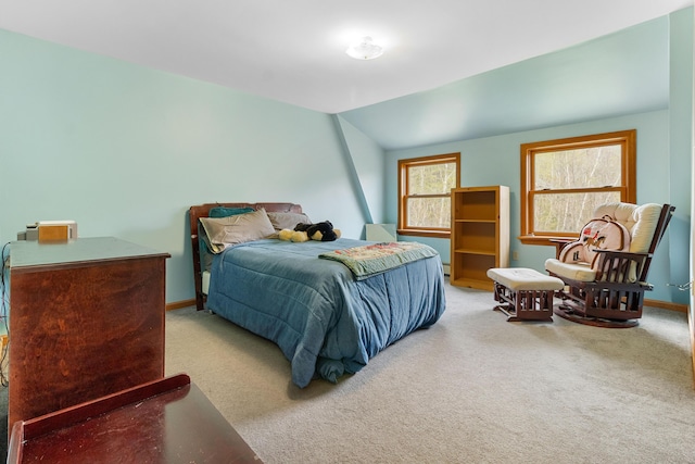 289 W Washington Rd, Washington, ME 04574 - carpeted bedroom featuring baseboards and vaulted ceiling