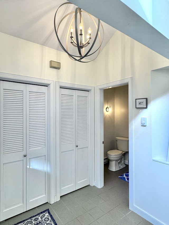 54 Village Way Unit 54, Rockport, ME 04856 - bathroom with a closet, a chandelier, toilet, and tile patterned floors