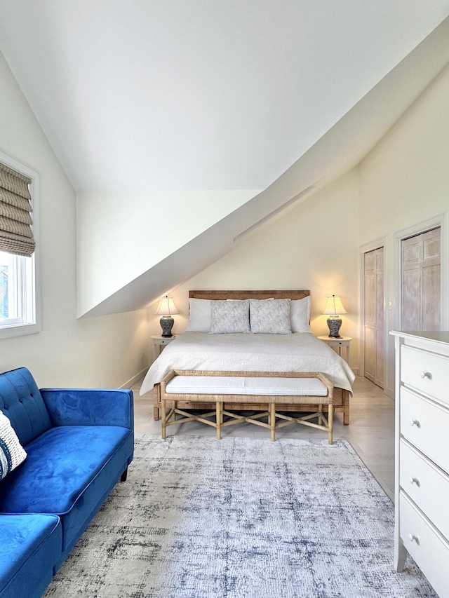 54 Village Way Unit 54, Rockport, ME 04856 - bedroom featuring lofted ceiling and wood finished floors
