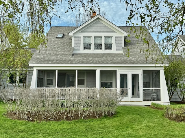 54 Village Way Unit 54, Rockport, ME 04856 - rear view of property featuring a sunroom, roof with shingles, and a yard