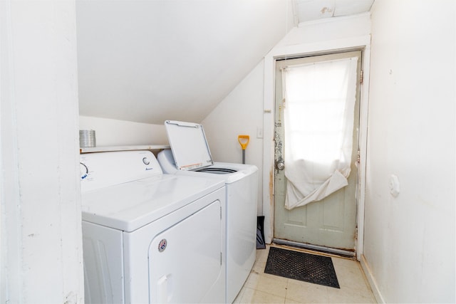washroom featuring washing machine and clothes dryer