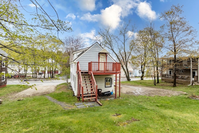 view of outbuilding featuring stairs