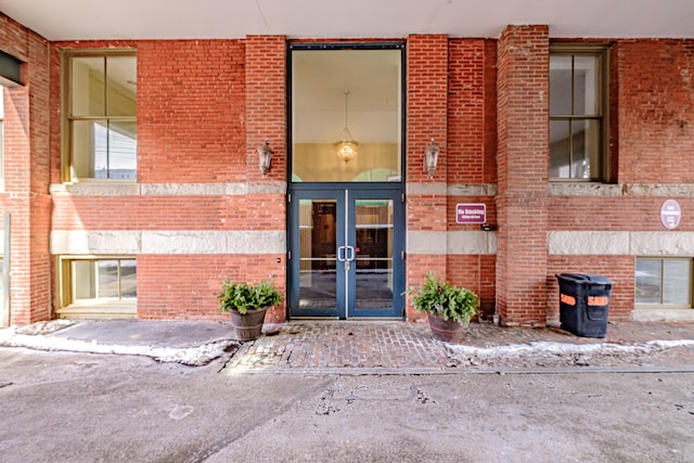 79 Bramhall St, Portland, ME 04102 - property entrance featuring french doors and brick siding