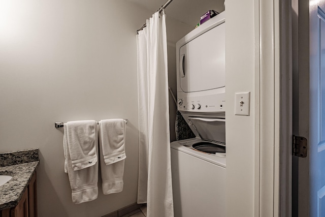 79 Bramhall St, Portland, ME 04102 - washroom featuring stacked washing machine and dryer