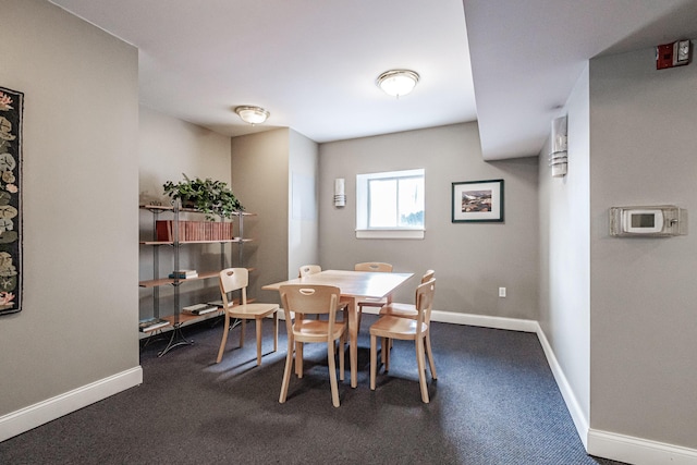 79 Bramhall St, Portland, ME 04102 - dining area with baseboards and dark colored carpet
