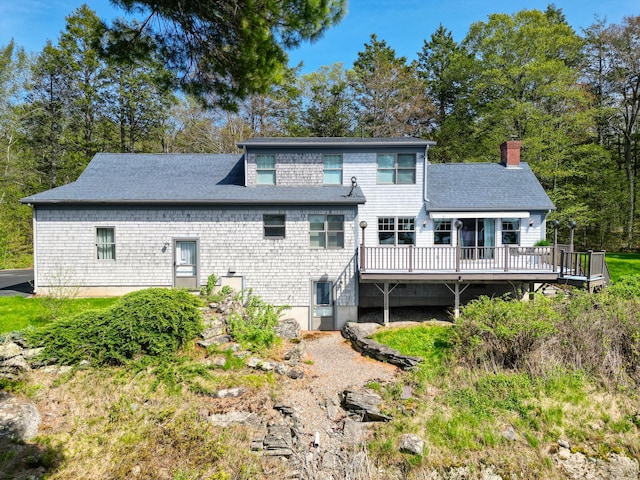 20 Eagle Point Rd, Bath, ME 04530 - back of property featuring a deck, a chimney, and a shingled roof