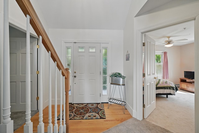 20 Eagle Point Rd, Bath, ME 04530 - foyer featuring a ceiling fan, stairs, wood finished floors, and baseboards