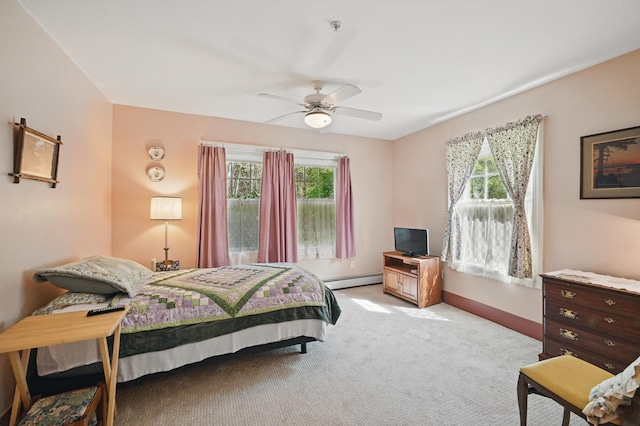 20 Eagle Point Rd, Bath, ME 04530 - bedroom featuring multiple windows, light carpet, a baseboard radiator, and baseboards