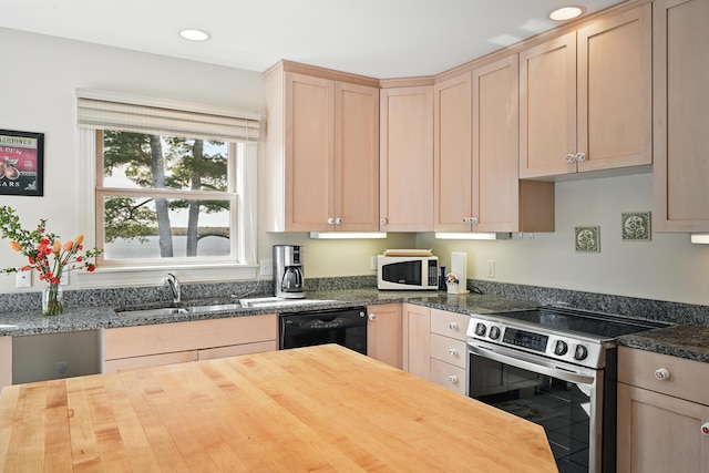 20 Eagle Point Rd, Bath, ME 04530 - kitchen featuring stainless steel range with electric cooktop, white microwave, black dishwasher, light brown cabinets, and butcher block countertops