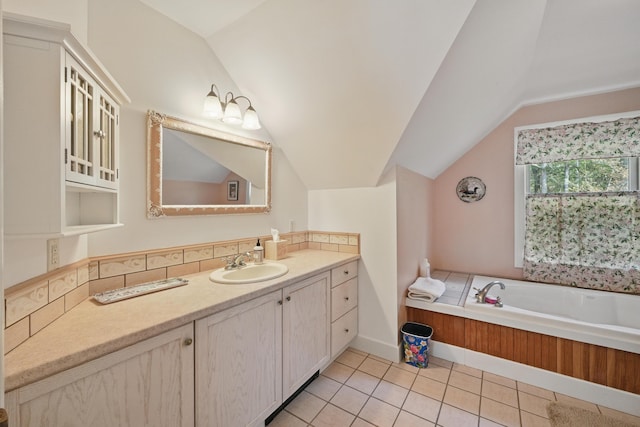 20 Eagle Point Rd, Bath, ME 04530 - full bathroom featuring lofted ceiling, vanity, a bath, and tile patterned flooring