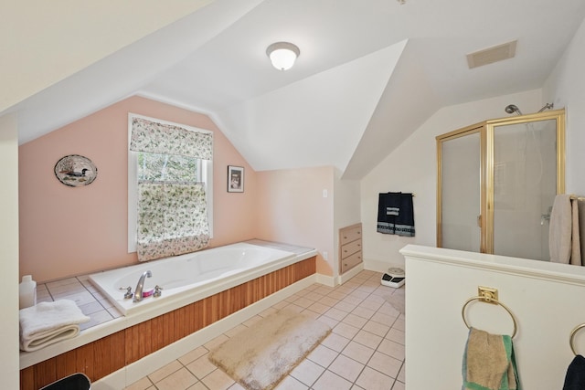 20 Eagle Point Rd, Bath, ME 04530 - bathroom featuring a bath, lofted ceiling, a shower stall, and tile patterned floors