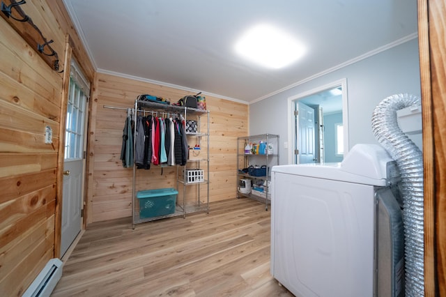 50 Beans Mill Rd, Corinth, ME 04427 - walk in closet featuring washer / clothes dryer, baseboard heating, and light wood-type flooring