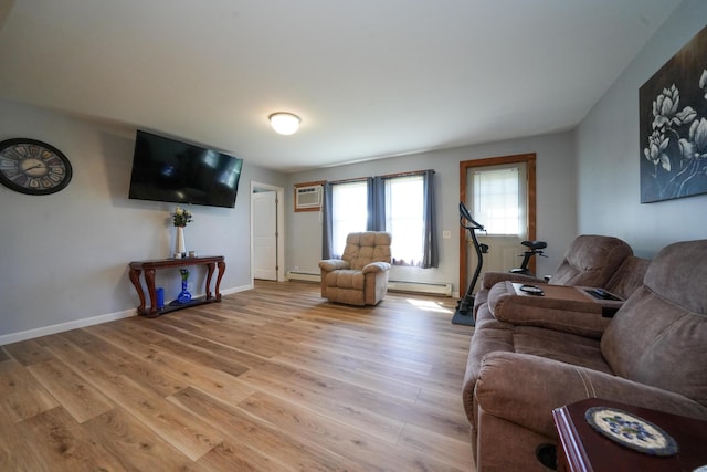 50 Beans Mill Rd, Corinth, ME 04427 - living area with a baseboard radiator, light wood finished floors, and a wall mounted AC