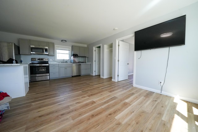 50 Beans Mill Rd, Corinth, ME 04427 - kitchen featuring appliances with stainless steel finishes, gray cabinets, a sink, and light countertops