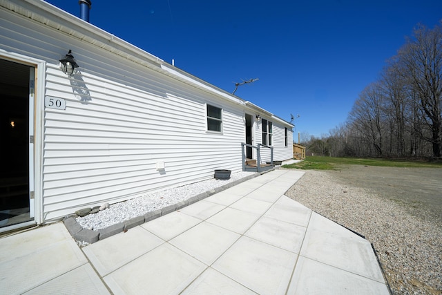 50 Beans Mill Rd, Corinth, ME 04427 - view of property exterior featuring a patio