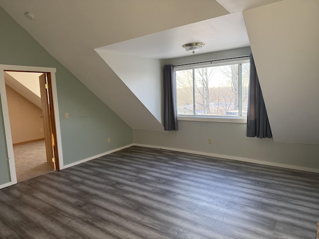 50 Beans Mill Rd, Corinth, ME 04427 - bonus room with dark wood-type flooring, lofted ceiling, and baseboards