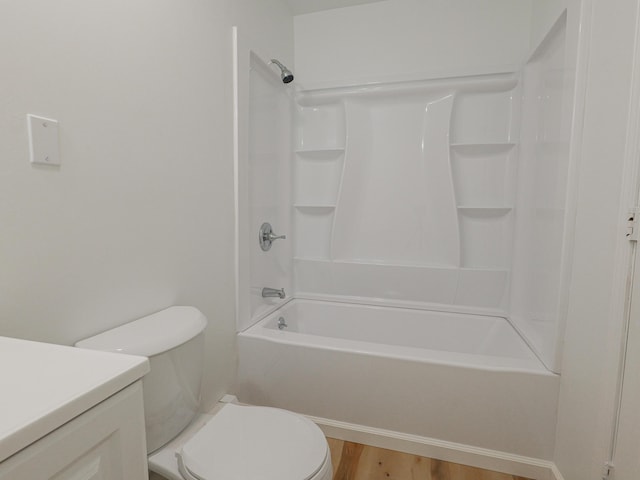 35 Mathews Ave Unit 8, Waterville, ME 04901 - bathroom with vanity, toilet, washtub / shower combination, and wood finished floors