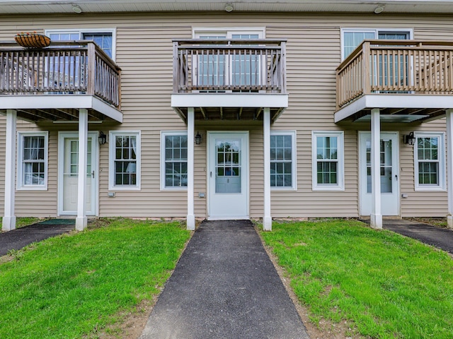 35 Mathews Ave Unit 8, Waterville, ME 04901 - view of exterior entry with a lawn