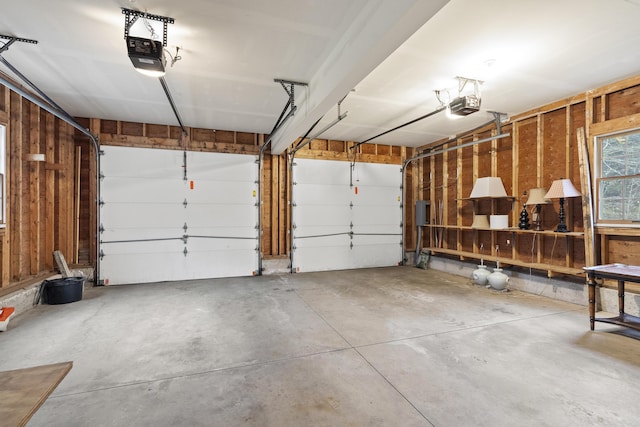 49 Dipper Cove Rd, Harpswell, ME 04066 - garage featuring a garage door opener