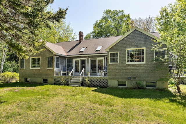 49 Dipper Cove Rd, Harpswell, ME 04066 - back of house featuring a lawn, a chimney, and a shingled roof