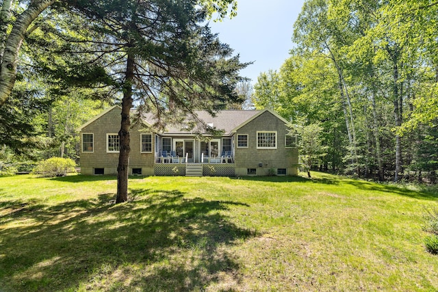 49 Dipper Cove Rd, Harpswell, ME 04066 - view of front of house featuring a sunroom and a front yard