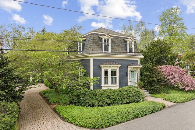 31 Mackworth St, Portland, ME 04103 - view of home's exterior with mansard roof