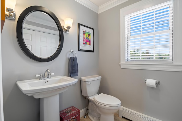 42 Snowberry Dr, Gorham, ME 04038 - half bath with a baseboard radiator, toilet, baseboards, and crown molding