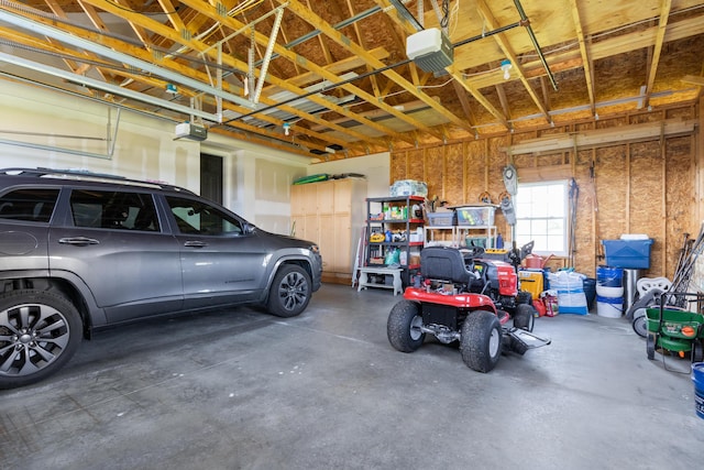 42 Snowberry Dr, Gorham, ME 04038 - garage featuring a garage door opener