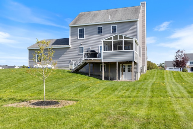 42 Snowberry Dr, Gorham, ME 04038 - rear view of property featuring a sunroom, a deck, stairway, a yard, and a shingled roof