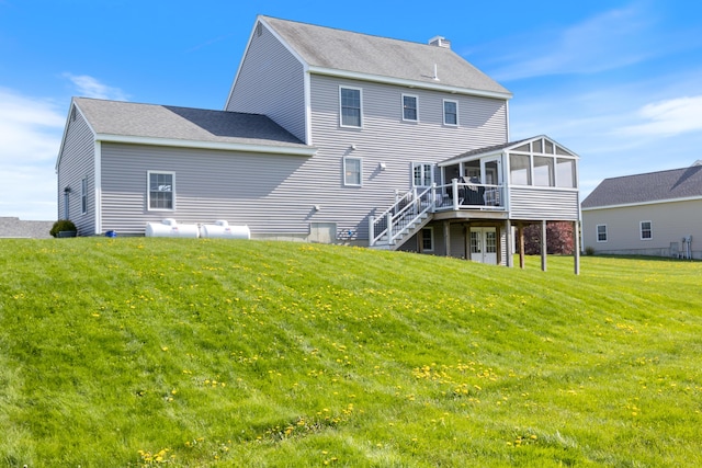 42 Snowberry Dr, Gorham, ME 04038 - back of property with a sunroom, a yard, a deck, stairs, and french doors