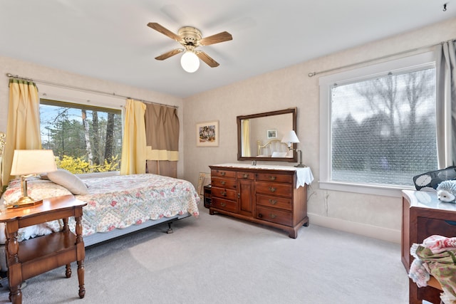 447 Wiscasset Rd, Boothbay, ME 04537 - bedroom with light colored carpet and a ceiling fan