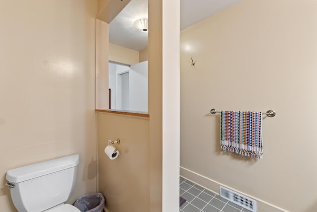 447 Wiscasset Rd, Boothbay, ME 04537 - bathroom featuring toilet, tile patterned flooring, and baseboards