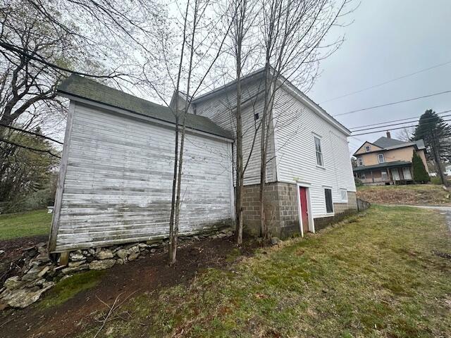 627 Prospect Ave, Rumford, ME 04276 - view of home's exterior with a yard