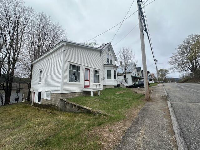 627 Prospect Ave, Rumford, ME 04276 - view of front of property with a front yard