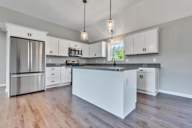 LOT11 Laney Ln, Wells, ME 04090 - kitchen with appliances with stainless steel finishes, white cabinetry, and lofted ceiling