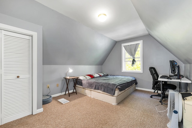28-30 W Winds Dr, Lebanon, ME 04027 - carpeted bedroom with lofted ceiling, baseboards, and an office area