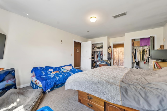 28-30 W Winds Dr, Lebanon, ME 04027 - carpeted bedroom featuring a spacious closet and baseboards
