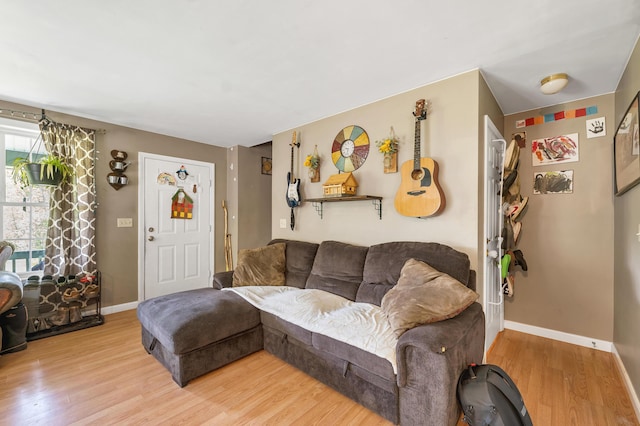 28-30 W Winds Dr, Lebanon, ME 04027 - living area featuring light wood-style floors and baseboards