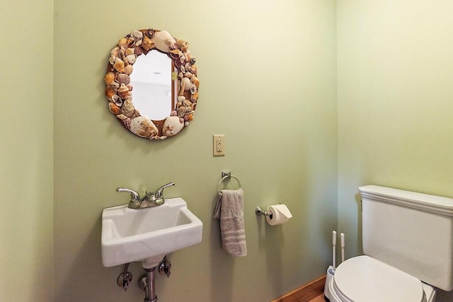 202 Wildewood Ests, Rome, ME 04963 - half bathroom featuring toilet and a sink