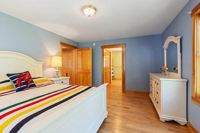 202 Wildewood Ests, Rome, ME 04963 - bedroom with light wood-style flooring and baseboards