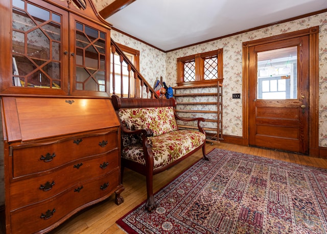 15 Federal St, Bar Harbor, ME 04609 - entrance foyer with wallpapered walls, hardwood / wood-style flooring, crown molding, and baseboards