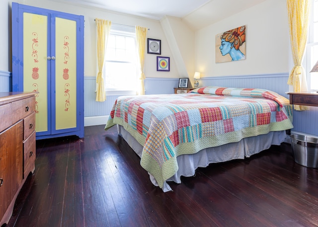 15 Federal St, Bar Harbor, ME 04609 - bedroom featuring hardwood / wood-style floors, a wainscoted wall, lofted ceiling, and baseboards